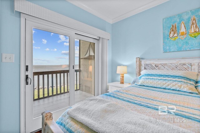 bedroom featuring access to exterior and crown molding