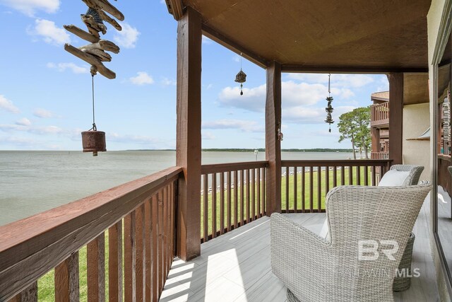 deck featuring a water view