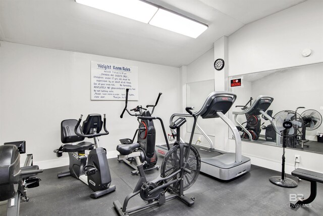 workout area featuring lofted ceiling