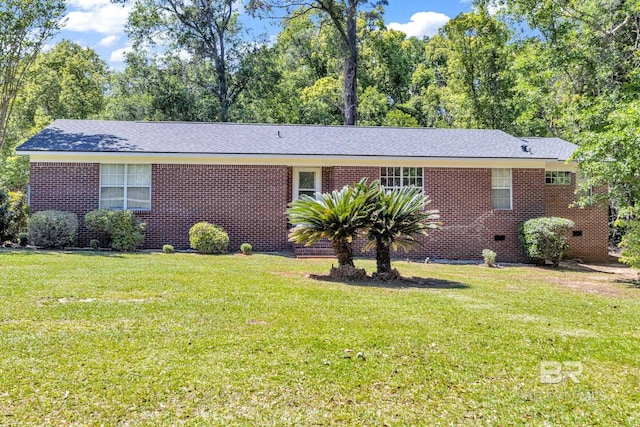 ranch-style home with a front lawn