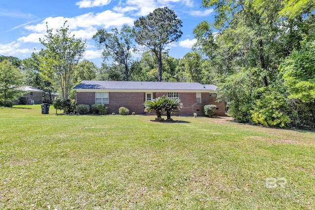 single story home with a front yard