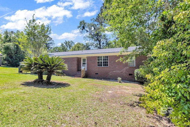 exterior space with a front yard