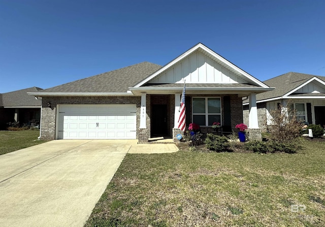 view of front facade featuring an attached garage, board and batten siding, a front yard, covered porch, and brick siding