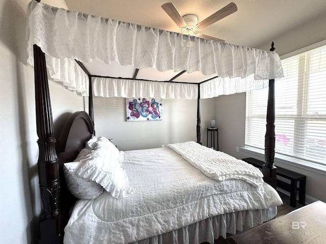 bedroom featuring multiple windows