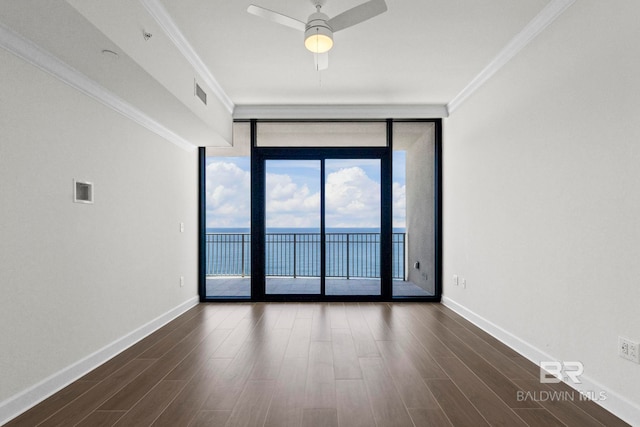 533 E Beach Blvd Unit 1905, Gulf Shores, AL 36542 - empty room with expansive windows, dark wood-style floors, a water view, crown molding, and baseboards
