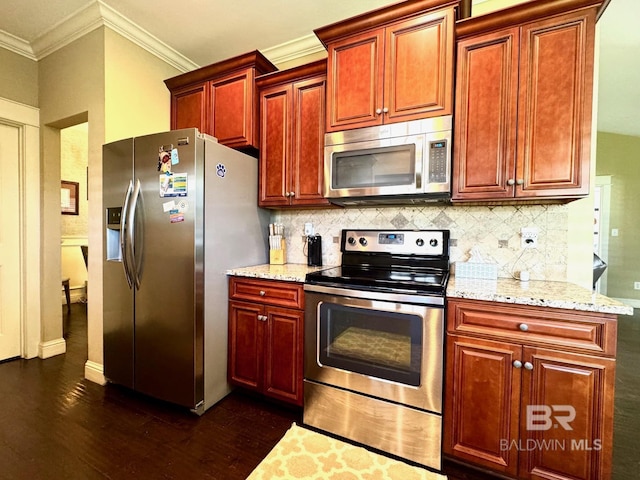1030 Crown Walk Dr, Foley, AL 36535 - kitchen featuring stainless steel appliances, dark wood-type flooring, crown molding, and decorative backsplash