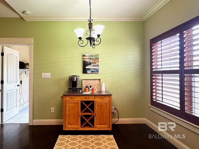 1030 Crown Walk Dr, Foley, AL 36535 - dining space featuring dark wood-type flooring, a chandelier, and crown molding