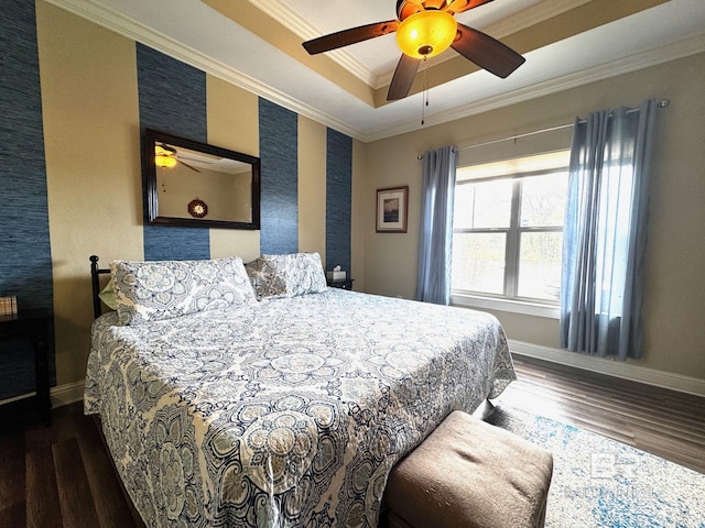 1030 Crown Walk Dr, Foley, AL 36535 - bedroom featuring ornamental molding, dark wood finished floors, a raised ceiling, and ceiling fan