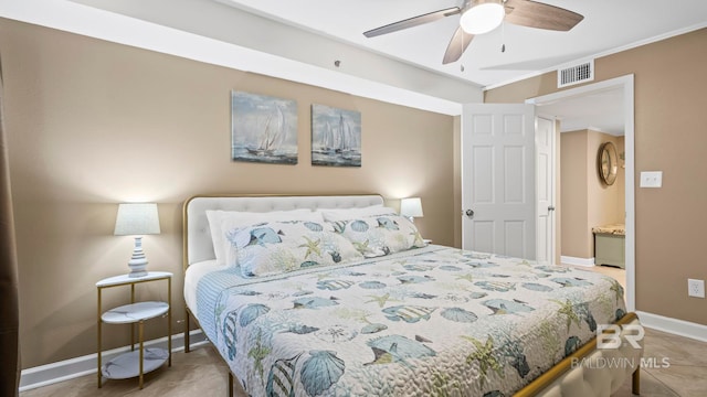 24132 Perdido Beach Blvd Unit 1011, Orange Beach, AL 36561 - tiled bedroom with baseboards, a ceiling fan, and ornamental molding