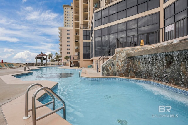 24132 Perdido Beach Blvd Unit 1011, Orange Beach, AL 36561 - community pool with a gazebo and a patio area