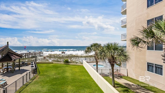 24132 Perdido Beach Blvd Unit 1011, Orange Beach, AL 36561 - water view featuring nearby beach and a fenced backyard