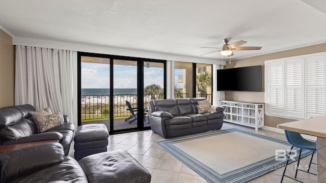 24132 Perdido Beach Blvd Unit 1011, Orange Beach, AL 36561 - living room with a ceiling fan, ornamental molding, and light tile patterned flooring
