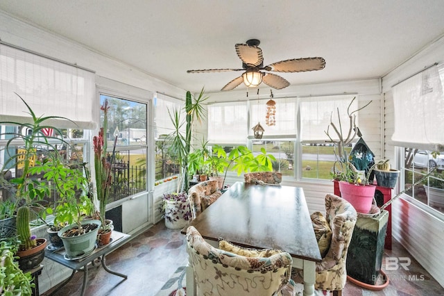 sunroom / solarium with ceiling fan