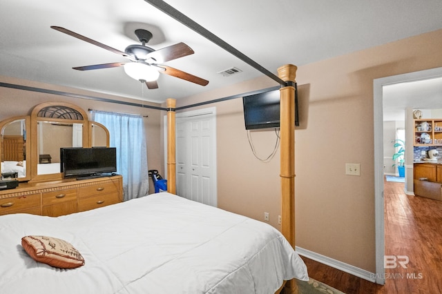 bedroom featuring a closet, ceiling fan, and hardwood / wood-style floors