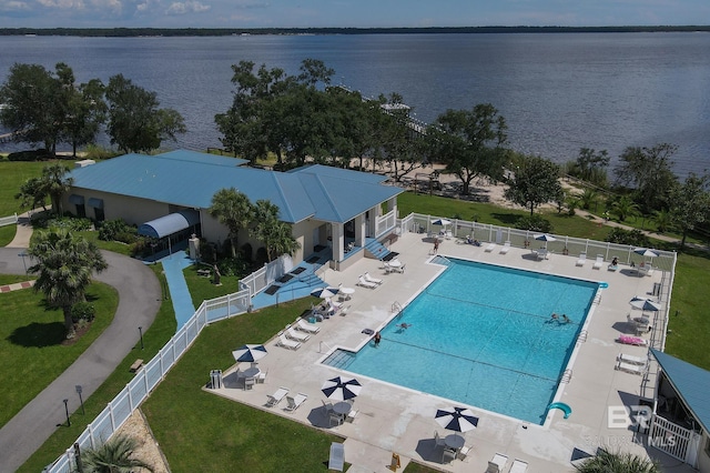 birds eye view of property featuring a water view