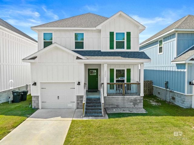 view of front of property with a front yard, a porch, and a garage