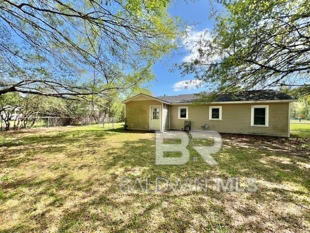 507 E Pine St, Atmore, AL 36502 - view of front of home with a front lawn