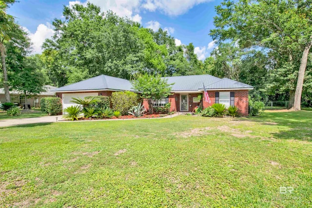 single story home featuring a garage and a front lawn