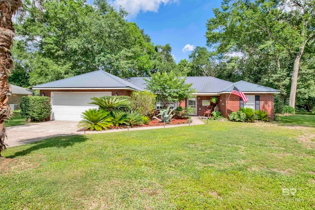 single story home featuring a front yard and a garage