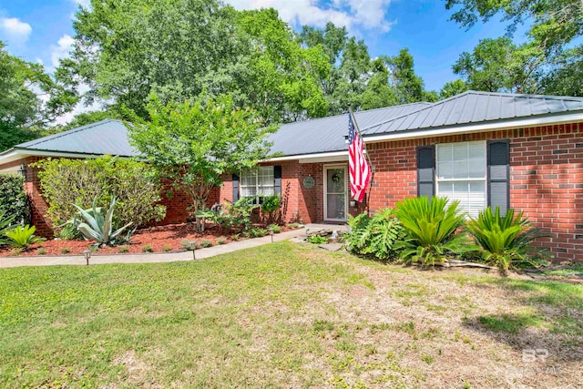 ranch-style house with a front yard