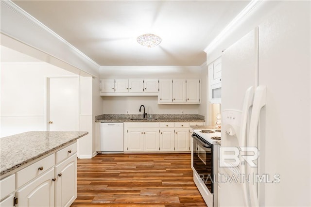 kitchen featuring light stone countertops, light wood-type flooring, white appliances, sink, and white cabinetry