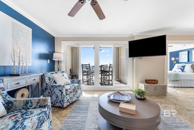 living area featuring ceiling fan and crown molding