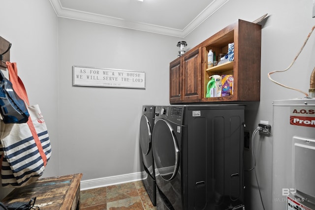 laundry area featuring ornamental molding, washer and dryer, baseboards, cabinet space, and water heater