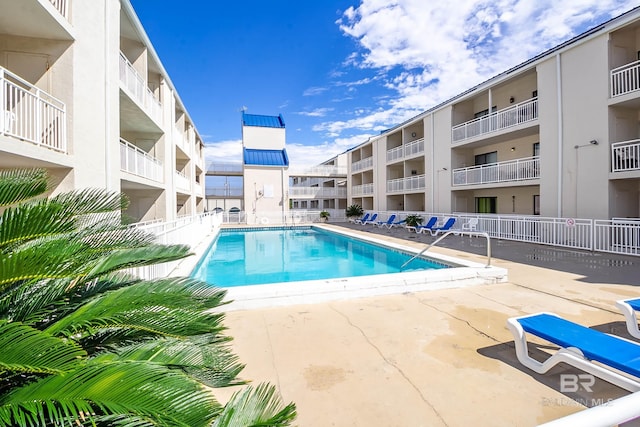 23044 Perdido Beach Blvd Unit 338, Orange Beach, AL 36561 - community pool featuring a patio