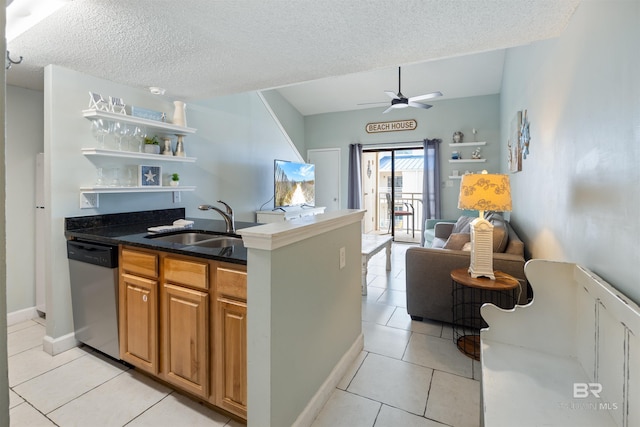 23044 Perdido Beach Blvd Unit 338, Orange Beach, AL 36561 - kitchen with stainless steel dishwasher, open shelves, ceiling fan, light tile patterned floors, and a sink