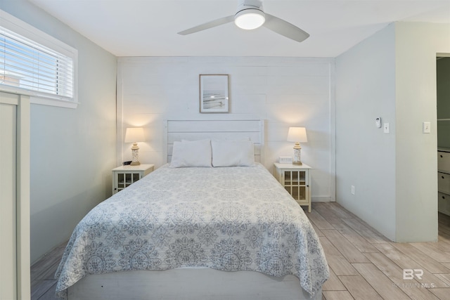 23044 Perdido Beach Blvd Unit 338, Orange Beach, AL 36561 - bedroom with wood finished floors and ceiling fan