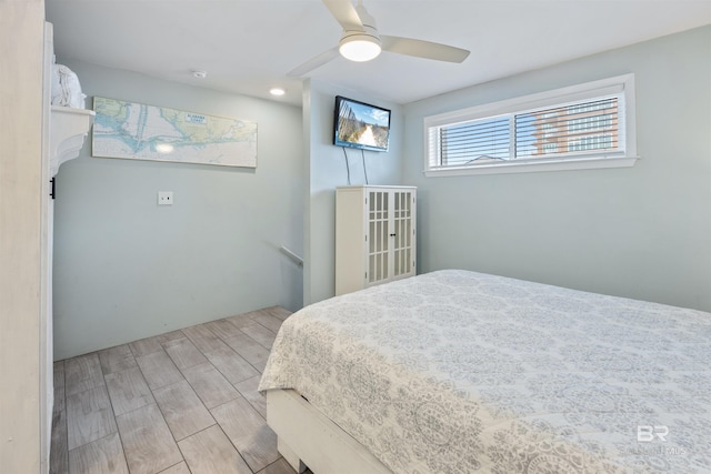 23044 Perdido Beach Blvd Unit 338, Orange Beach, AL 36561 - bedroom featuring wood tiled floors and a ceiling fan