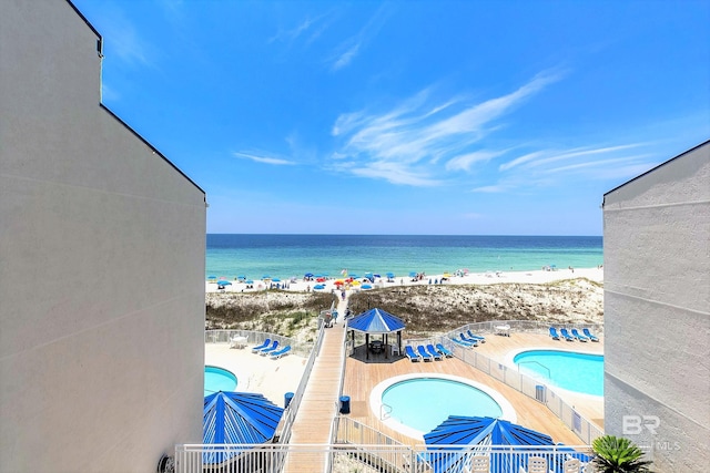 23044 Perdido Beach Blvd Unit 338, Orange Beach, AL 36561 - community pool with a water view and a patio area