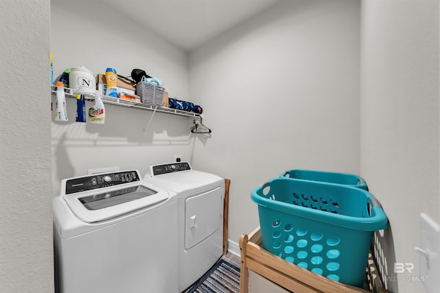 9365 Eiland Dr, Foley, AL 36535 - laundry room with washing machine and dryer and baseboards