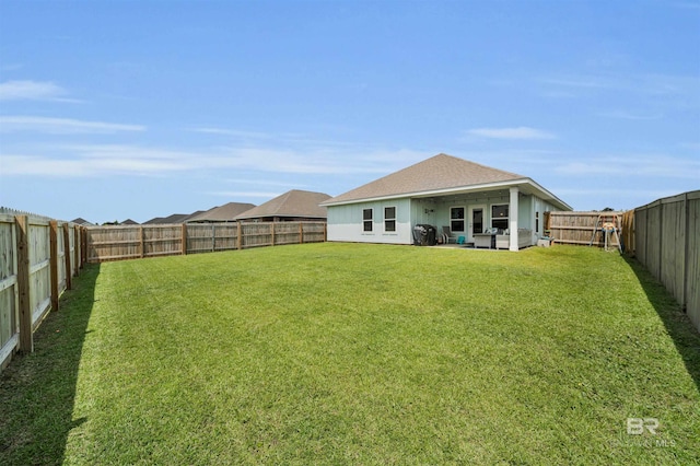 9365 Eiland Dr, Foley, AL 36535 - rear view of house with roof with shingles and a patio