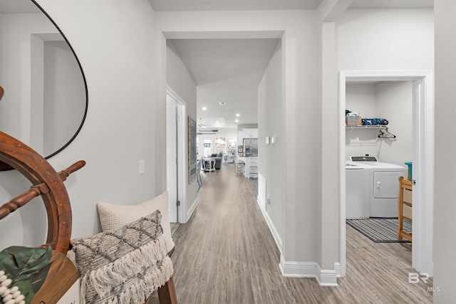 9365 Eiland Dr, Foley, AL 36535 - corridor with washer and dryer, wood finished floors, recessed lighting, and baseboards