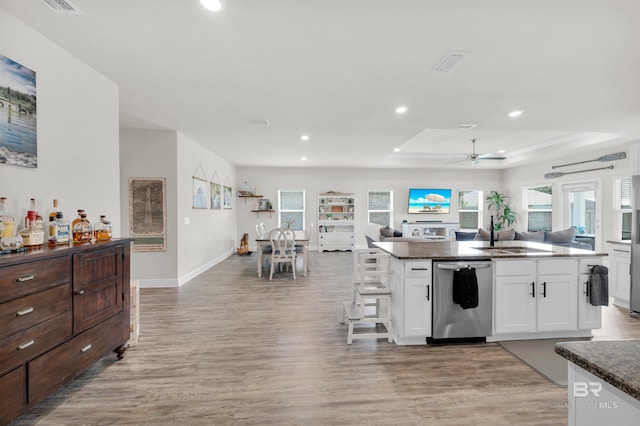 9365 Eiland Dr, Foley, AL 36535 - kitchen featuring dishwasher, a sink, light wood-style flooring, white cabinets, and recessed lighting