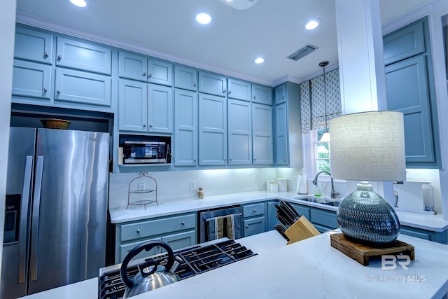 kitchen with stainless steel refrigerator with ice dispenser, light stone counters, backsplash, built in microwave, and pendant lighting