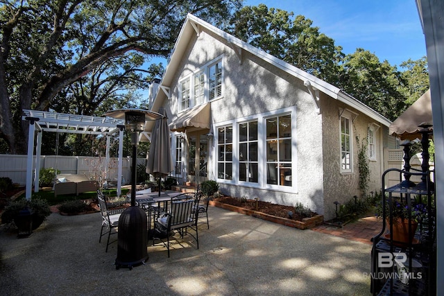 exterior space featuring a pergola and a patio area