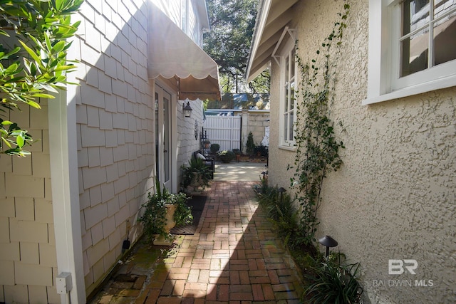 view of home's exterior featuring a patio