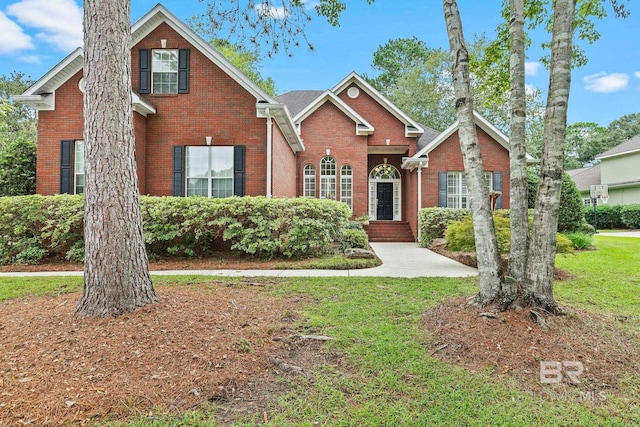 front of property featuring a front lawn