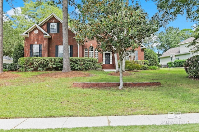 view of front of property with a front lawn