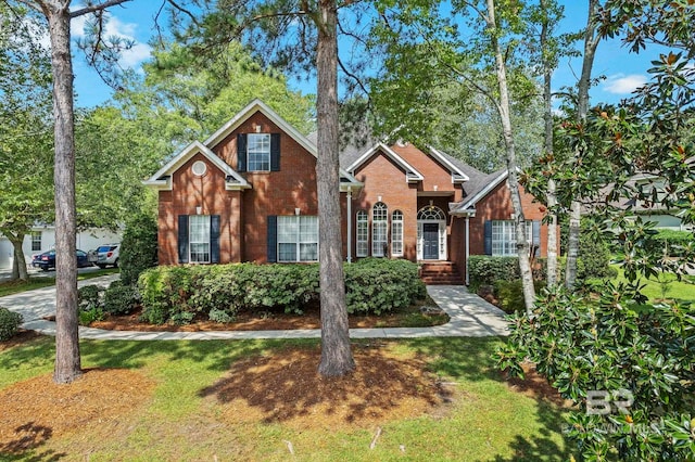 view of front of home with a front yard