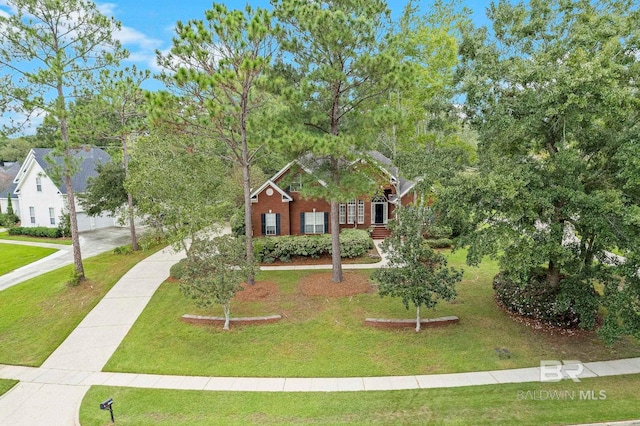 view of front of home with a front yard