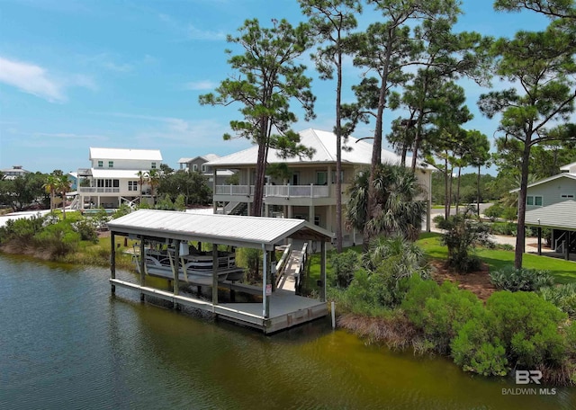 dock area with a water view