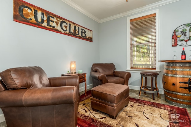 sitting room featuring crown molding