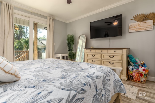 bedroom featuring access to exterior, wood-type flooring, ceiling fan, and crown molding