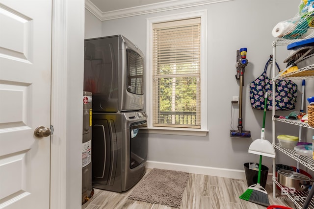 laundry area with stacked washing maching and dryer, ornamental molding, and light hardwood / wood-style floors