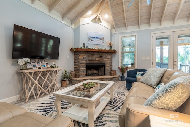 living room with a fireplace, french doors, wooden ceiling, and wood-type flooring