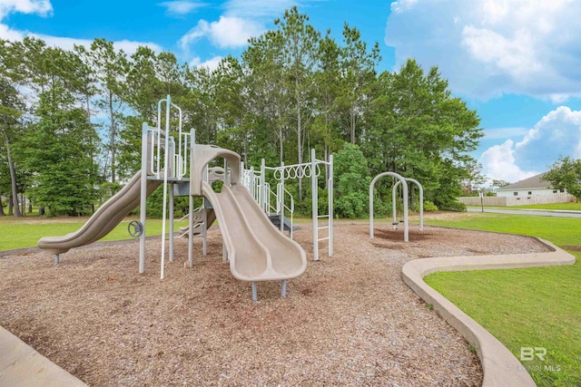 394 Haise Ln, Gulf Shores, AL 36542 - community playground featuring a yard and view of wooded area