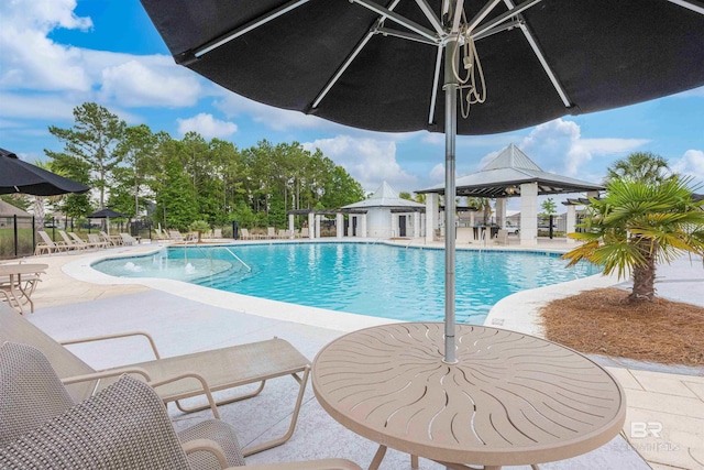 394 Haise Ln, Gulf Shores, AL 36542 - community pool with a gazebo and a patio